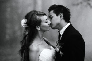 Newlyweds tenderly kissing